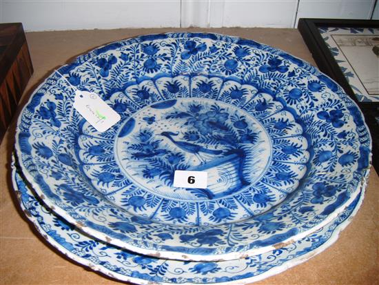 Near pair of 18th/19th century Delft blue and white chargers decorated with birds (a.f)